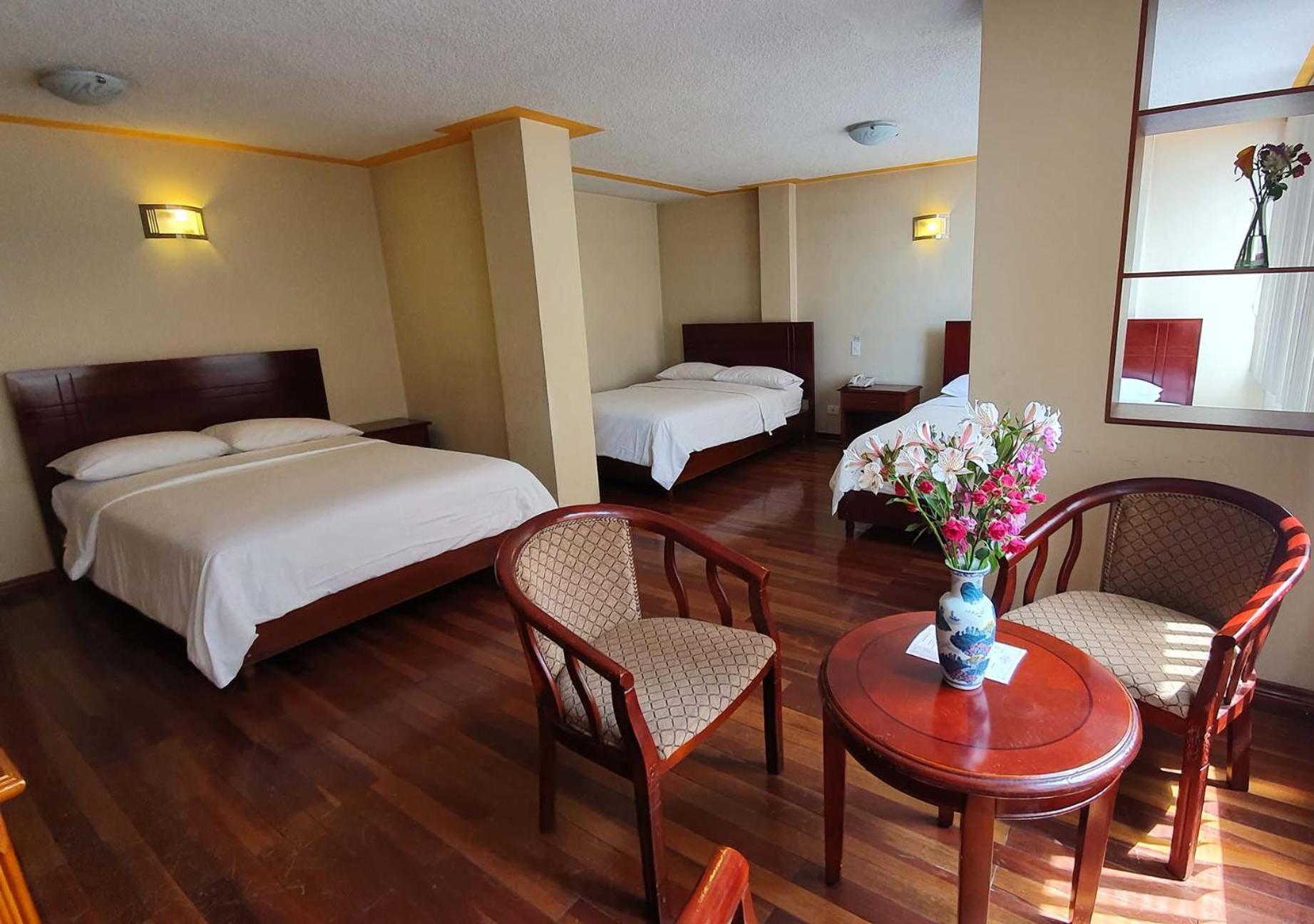 Hotel Lottus Quito Rum bild